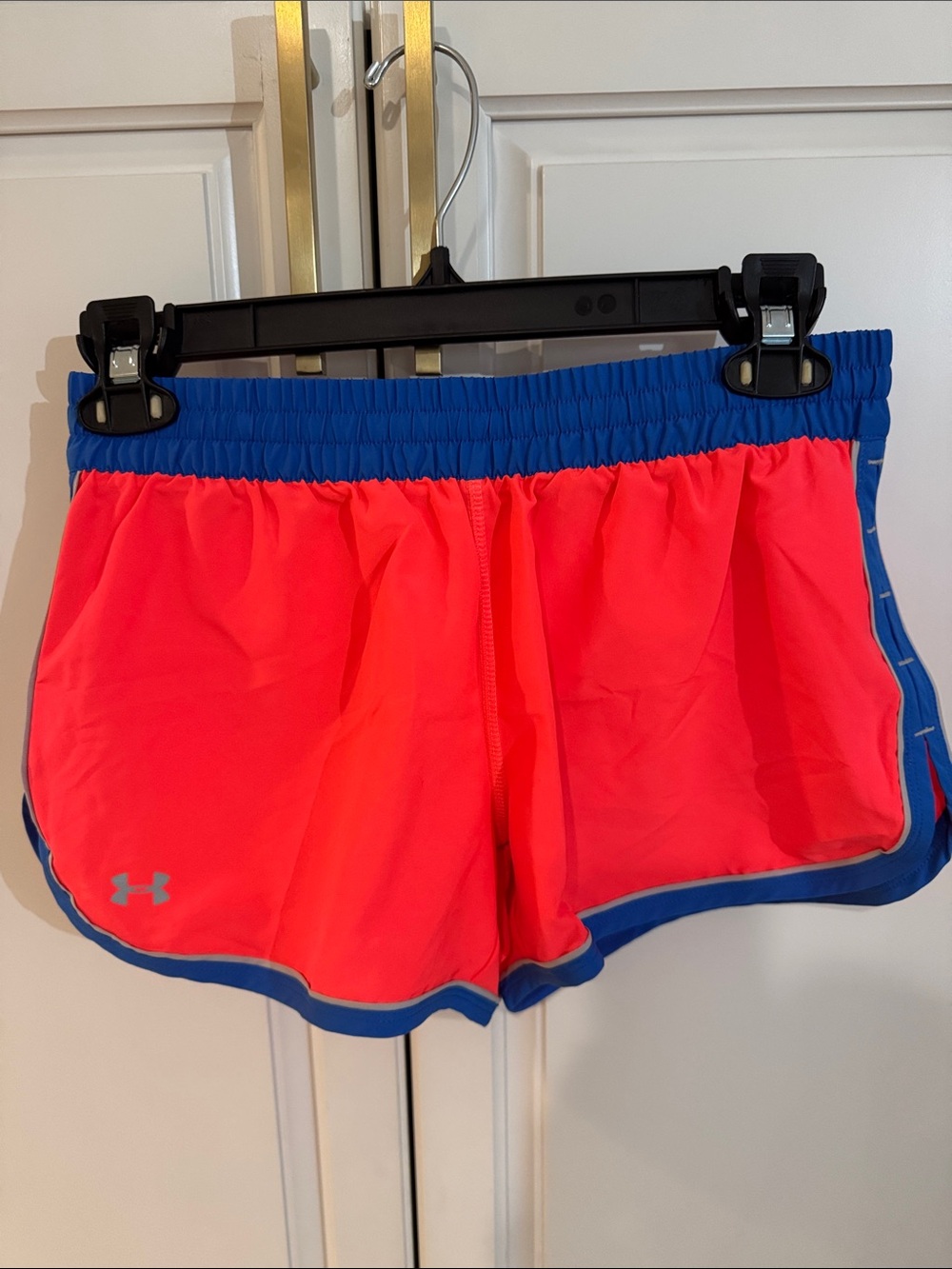 Under Armour Women’s Neon Pink Athletic Shorts with Blue Waistband